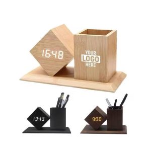 Alarm clock with pen holder